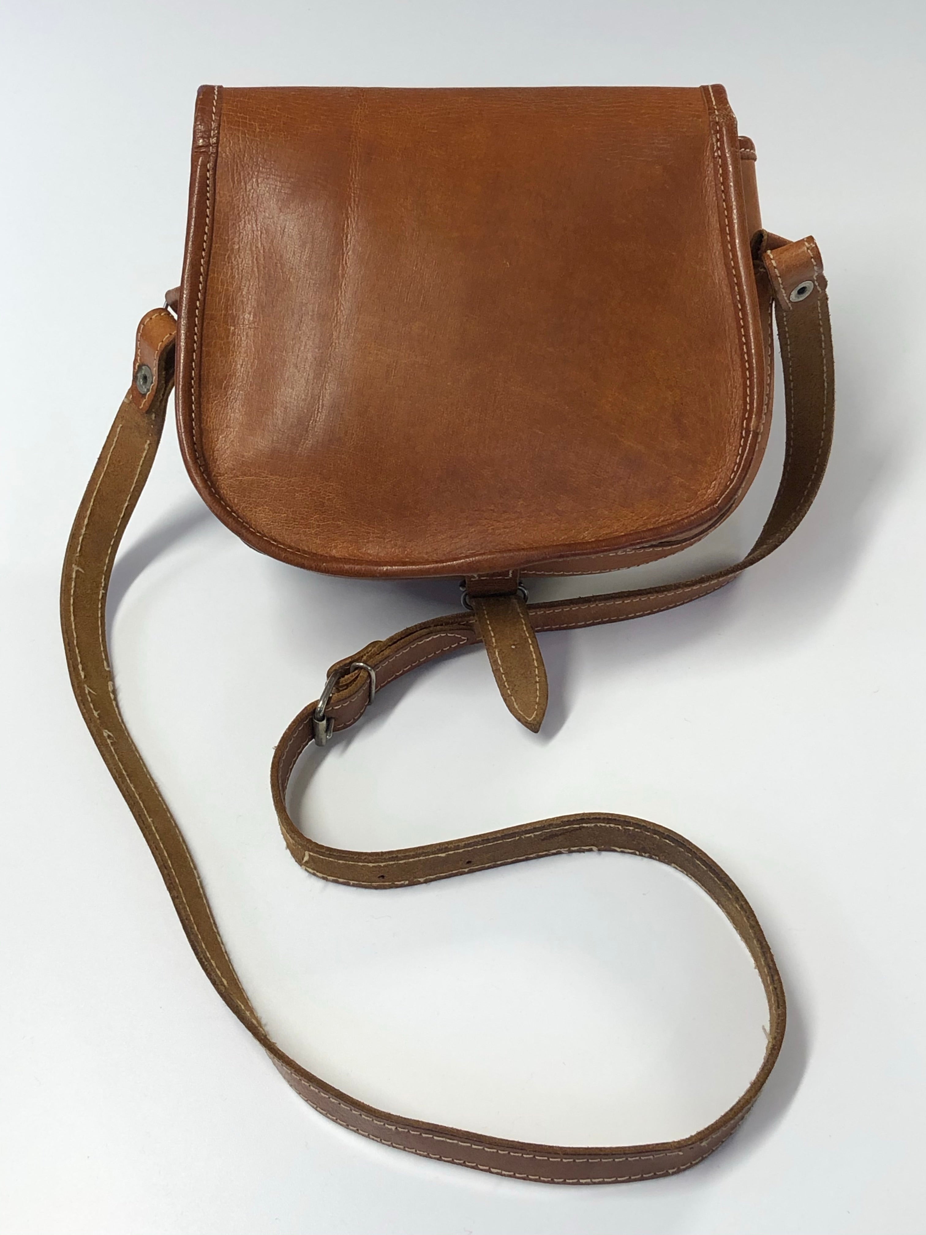 vintage cognac brown leather cross body saddle bag 70s – hong kong 